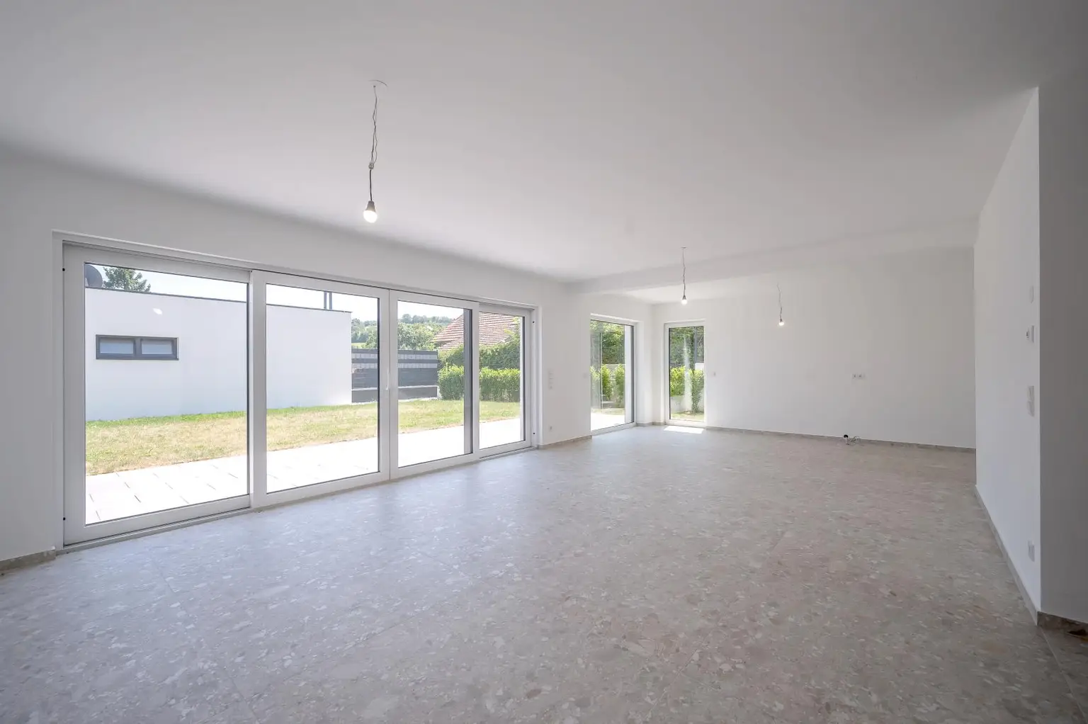 Erstbezug: Großzügiger Familientraum mit unverbaubarem Grünblick!