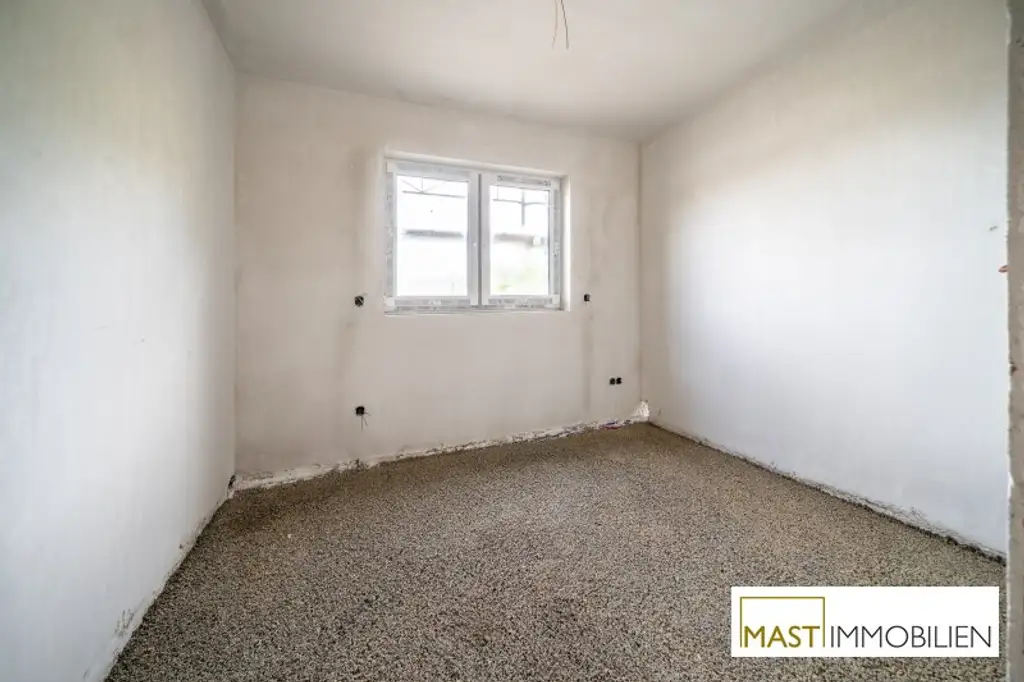 ERSTBEZUG - Modernes Einfamilienhaus mit 148 m² Wohnfläche, Balkon, Terrasse & 2 PKW-Stellplätzen in Strasshof – belagsfertig!