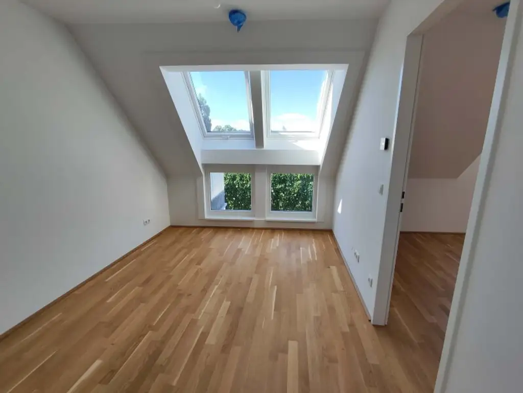 NEUBAU DACHGESCHOß-3-Zimmer-ERSTBEZUG mit Balkon in 1210 Wien! Top 2/50
