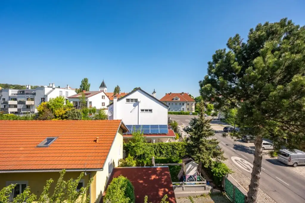 Panoramaliebling: Luxuriöse DG-Wohnung mit Dachterrasse und Fernblick