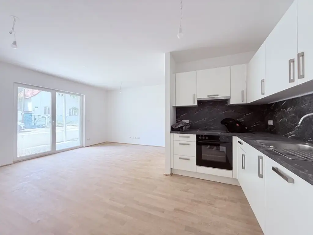 Erstbezug - Provisionsfreie und freifinanzierte Anlegerwohnung! Schöne 3 Zimmerwohnung mit Garten