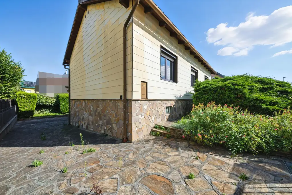 Ihr neues Zuhause: Einfamilienhaus mit vielseitigem Ausbaupotenzial in familienfreundlicher Stadtlage!