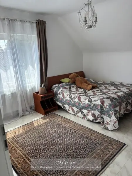 NEUWERTIGES EINFAMILIENHAUS AUF WUNDERSCHÖNEN GRUNDSTÜCK IN SONNIGER, RUHIGER SIEDLUNGSLAGE