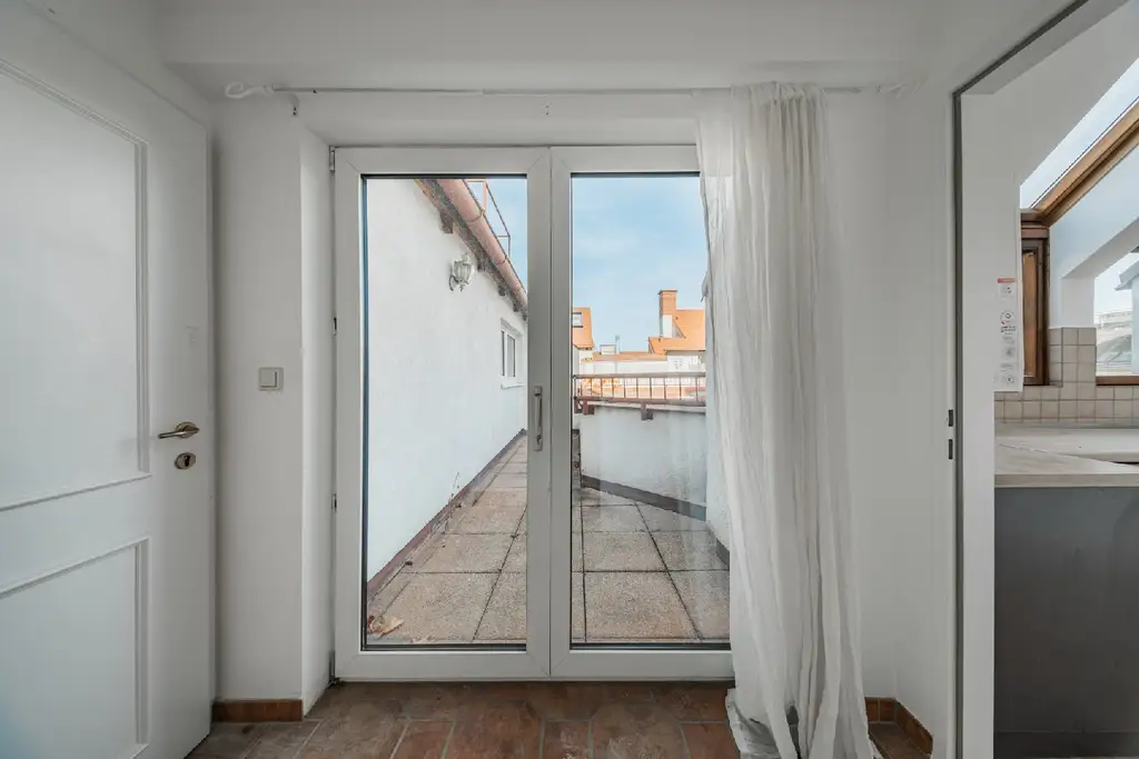 Kompakt & komfortabel – charmante Dachgeschoßwohnung mit Sonnenterrasse!