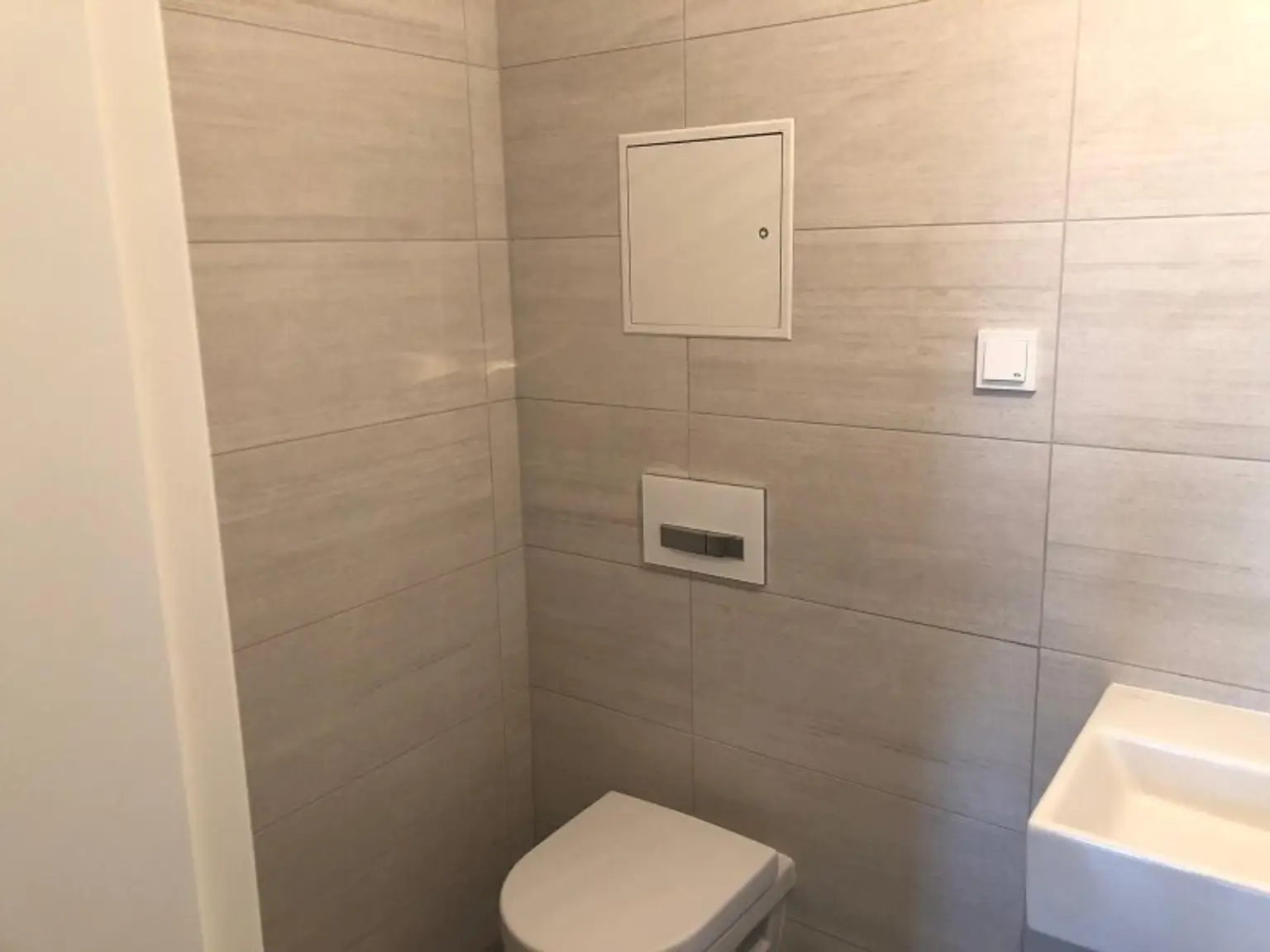 Moderne Anlegerwohnung mit Loggia und Tiefgaragenplatz