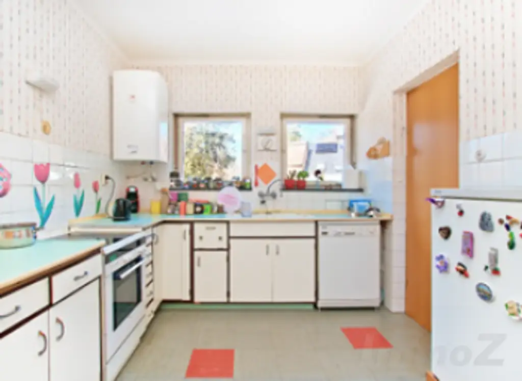 Vielseitiges Ein- oder Zweifamilienhaus mit großzügiger Dachterrasse in beliebter Lage