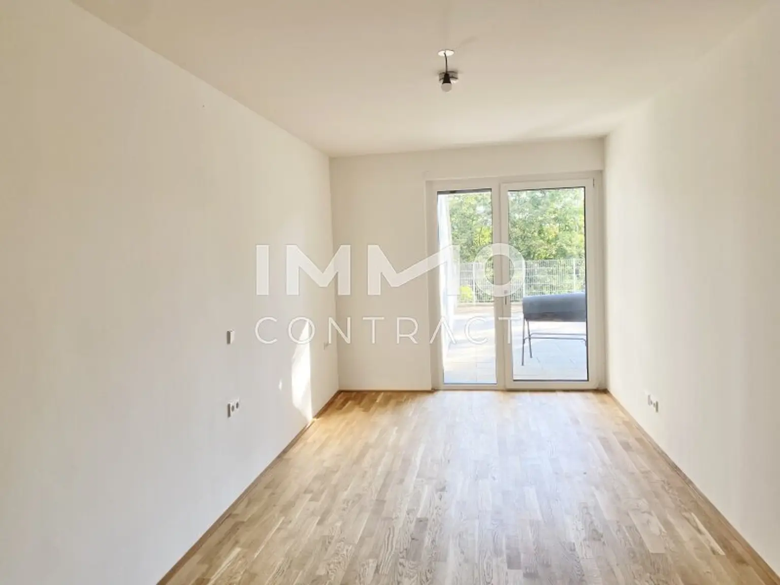 Schlafzimmer 2mit Zugang zur Terrasse