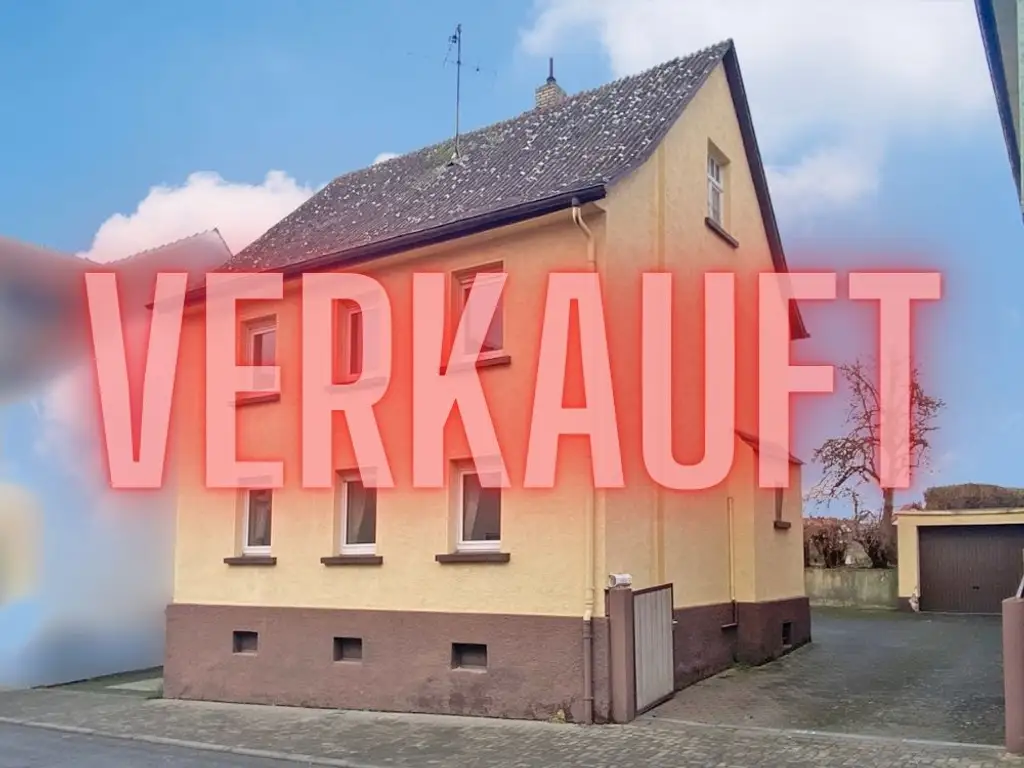 Solides Einfamilienhaus mit Garten & Garage