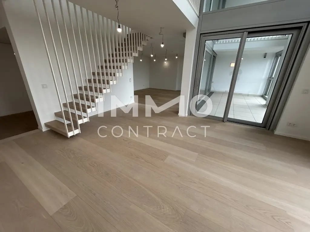 Exklusive Penthouse Wohnung auf 2 Etagen mit atemberaubenden Ausblick auf die Donau und die Innenstadt!