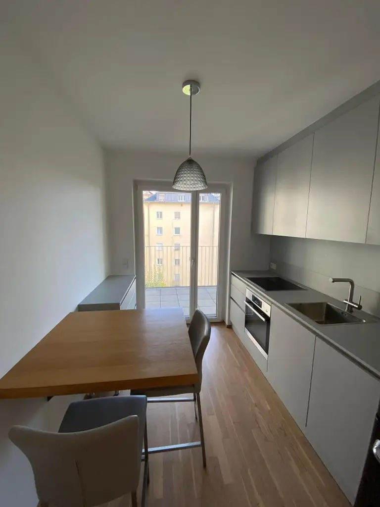 Moderne Neubauwohnung im Zentrum – mit Loggia u. Lift ! TIEFGARAGENPLATZ und KONTROLLIERTE WOHNRAUMBELÜFTUNG