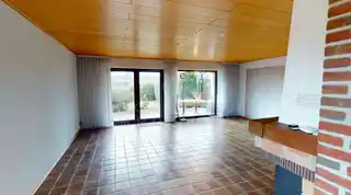 Wohnzimmer mit Zugang in den garten