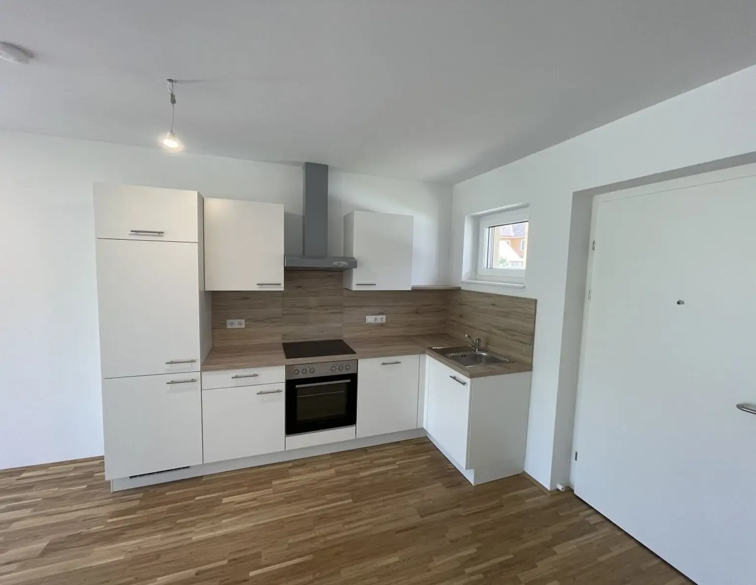 Moderne Erdgeschosswohnung in Heiligenkreuz: Erstbezug mit Terrasse