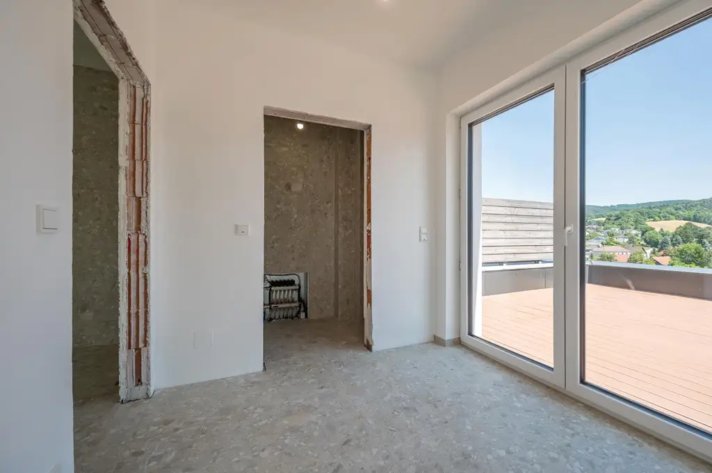 Erstbezug: Großzügiger Familientraum mit unverbaubarem Grünblick!
