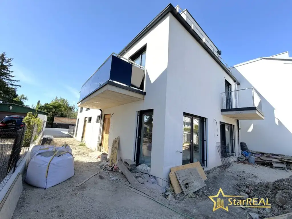 NEUBAU IN ZENTRUMSNÄHE! 5 ZIMMER-ZIEGELHAUS MIT 2 BÄDERN UND 3 WC´S.