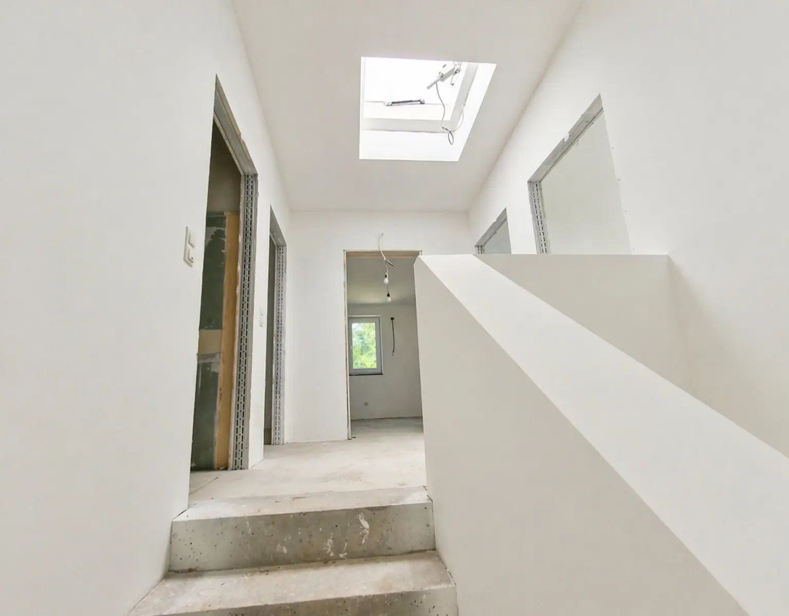 Wohnen mit Stil in Sigleß – Garage, Garten und Dachterrasse inklusive