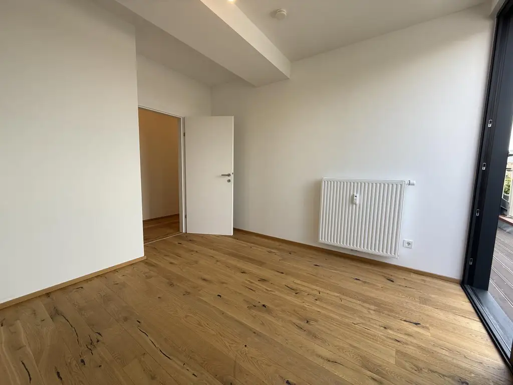 Erstbezug: Moderne Dachgeschosswohnung mit Balkon und Lift in begehrter Lage nahe dem Lendplatz K6/11