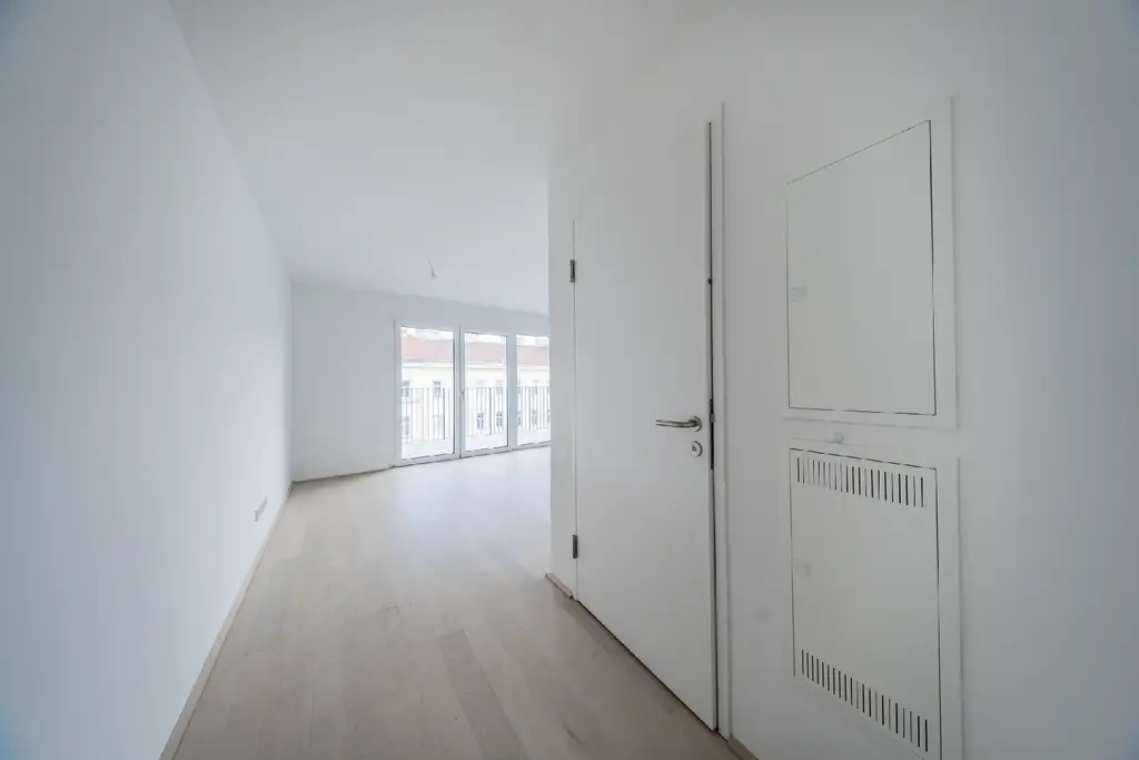 Moderne Stadtwohnung im 6. Stock mit Balkon – Erstbezug