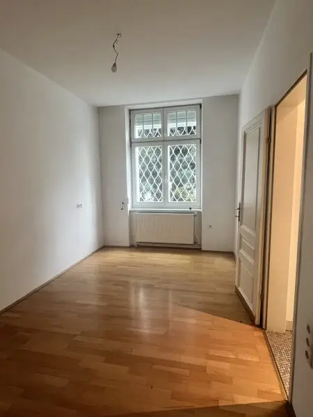 Exklusive Eigentumswohnung mit Garten & Veranda im Herzen von Ober St. Veit