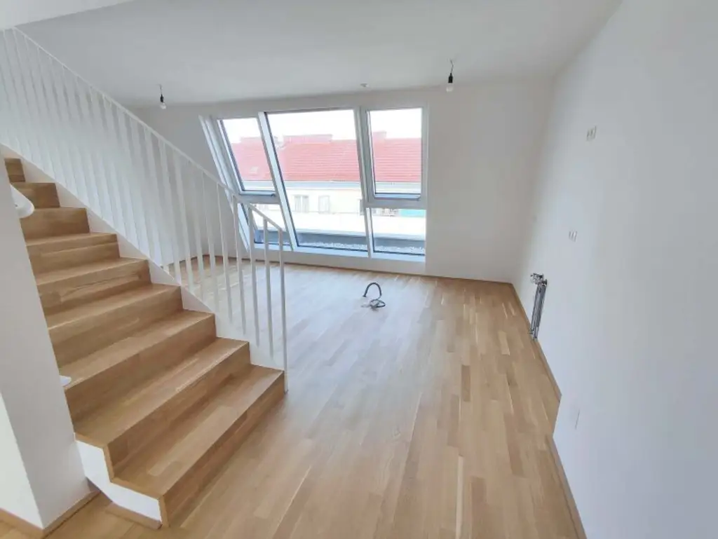 DACHGESCHOß-4-Zimmer-ERSTBEZUG mit Terrasse und privatem Liftzugang! Top 1/40