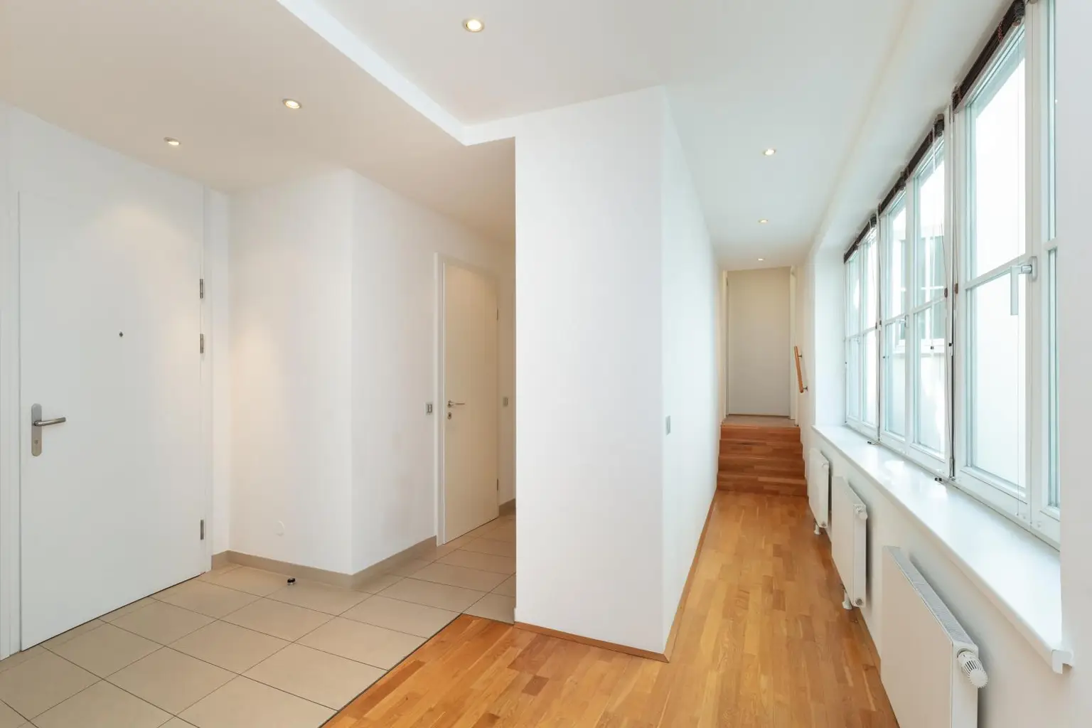 Altbau trifft Moderne – Wohnen über den Dächern