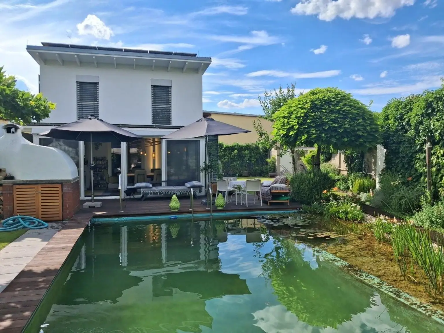 1 Haus mit Biotop Pool 1220