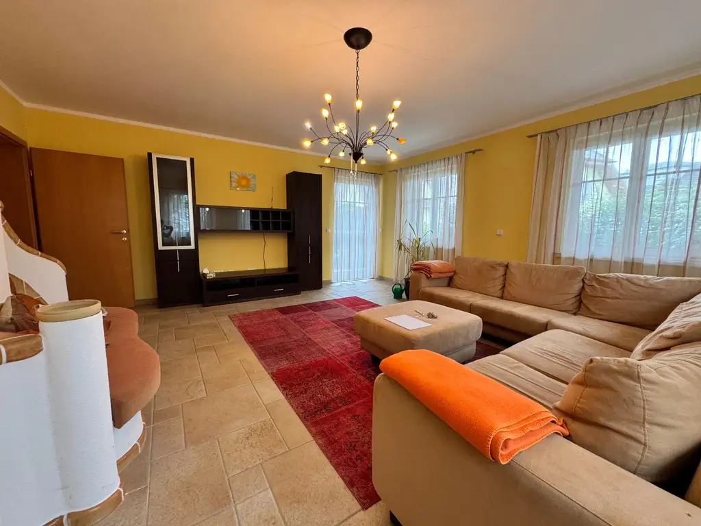 XXL Traum Bungalow mit Kachelofen überdachter Terrasse, Gartenoase, Wohnkeller und Doppelgarage  im Laahfeld /Ansfelden