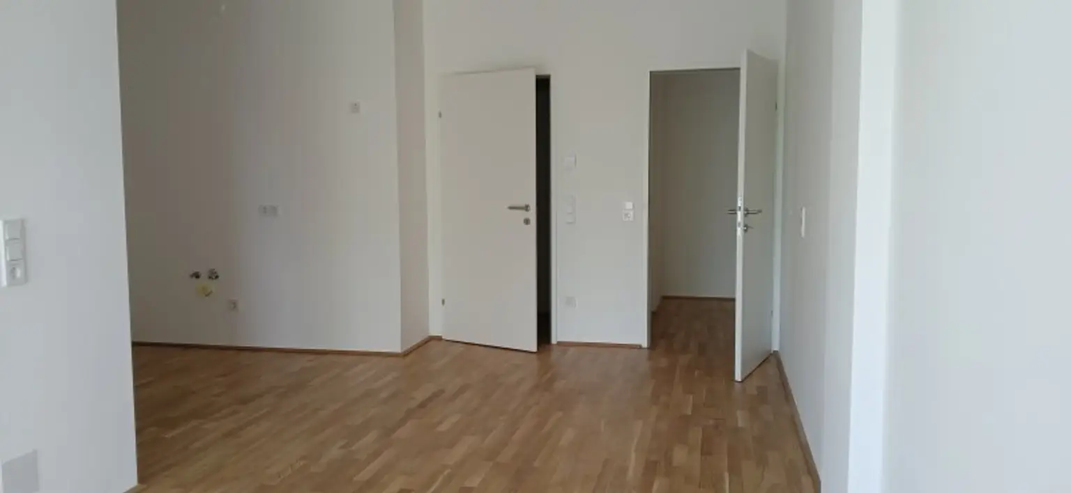 NEUBAU - ERSTBEZUG - Top 17 - Wunderschöne 2 Zimmerwohnung mit großem Balkon und eigenem Tiefgaragenplatz