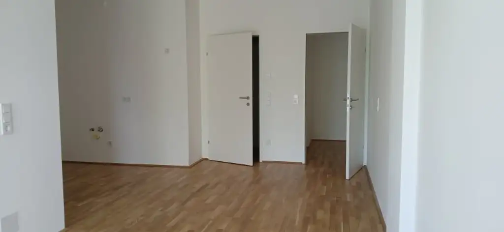 NEUBAU - ERSTBEZUG - Top 17 - Wunderschöne 2 Zimmerwohnung mit großem Balkon und eigenem Tiefgaragenplatz