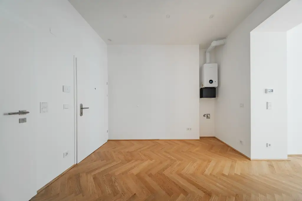 Altbaucharme neu interpretiert – 2 Zimmer im Erstbezug!