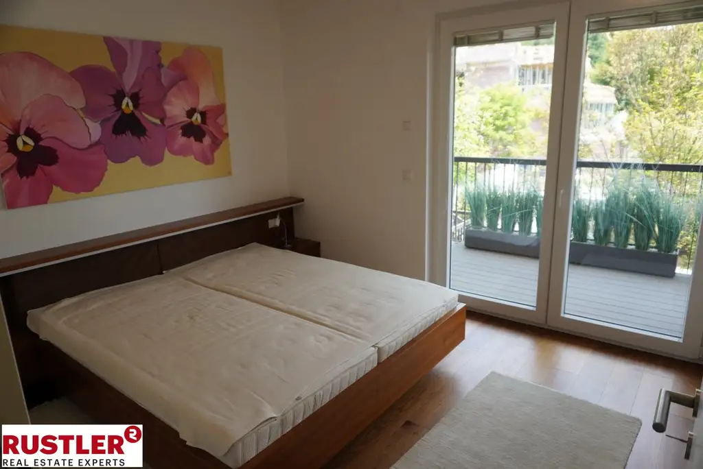 Exklusive Eigentumswohnung am See mit Privatstrand