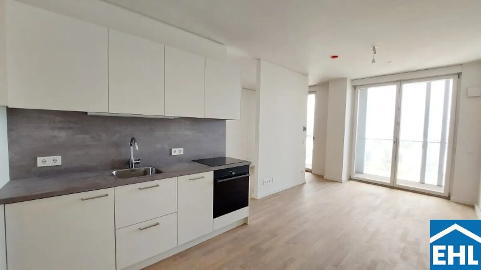 1,5-Zi.-Erstbezug mit Loggia & Rooftop Spa | TOWER HOMES im V22