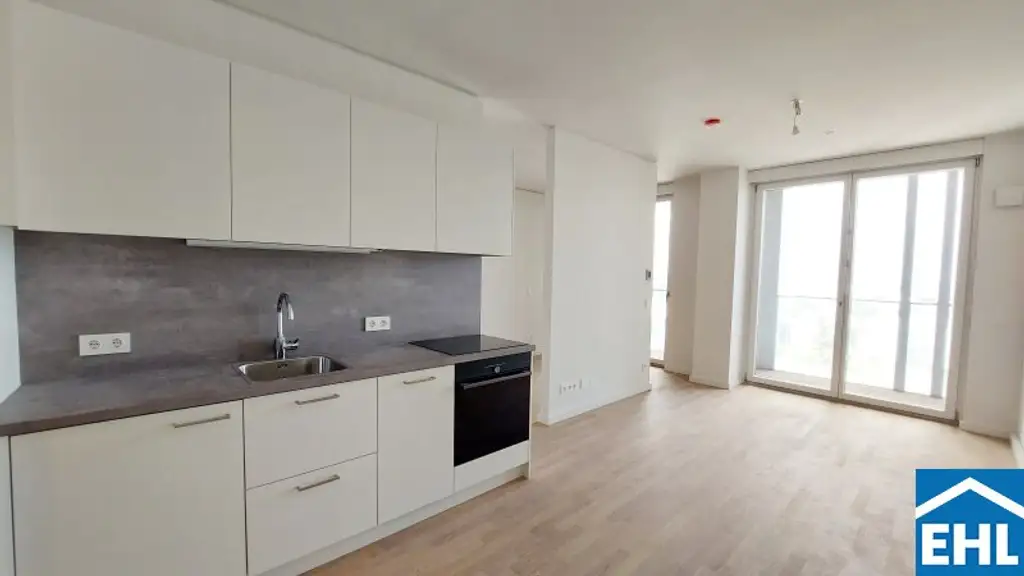 1,5-Zi.-Erstbezug mit Loggia & Rooftop Spa | TOWER HOMES im V22