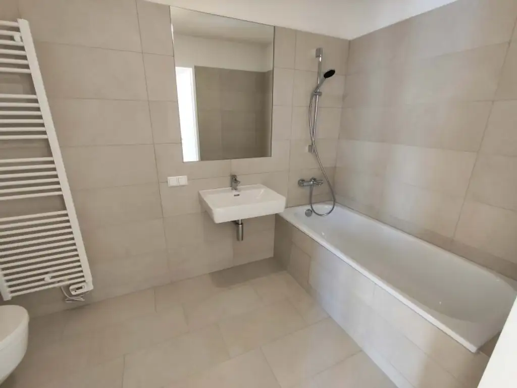TOP NEUBAU 3-Zimmer-ERSTBEZUG mit Terrasse im 4. OG in 1210 Wien! Top 1/27