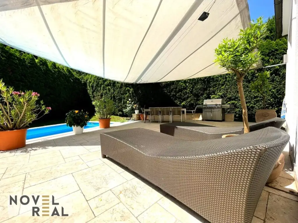 Exklusive Villa mit privatem Pool und idyllischem Garten in Toplage von Wien-Hietzing!
