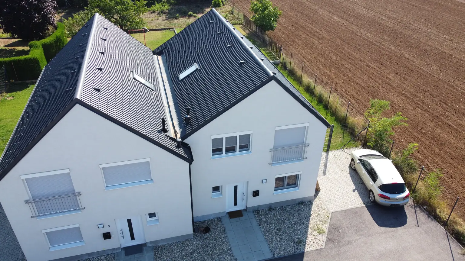 Neuwertige Doppelhaushälfte in Gänserndorf - 4 Zimmer, Keller, Garten, Terrasse, 2 Stellplätze!