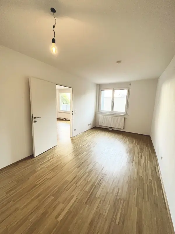 Moderne 2-Zimmer-Wohnung mit ruhiger Terrasse und Dachgarten - 
in U-Bahn-Nähe!