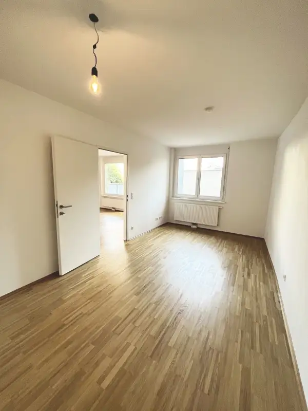 Moderne 2-Zimmer-Wohnung mit ruhiger Terrasse und Dachgarten - 
in U-Bahn-Nähe!