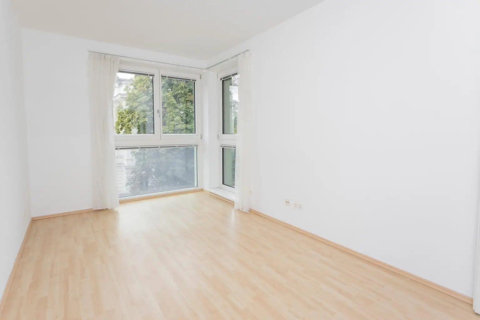 2-Zimmer-Wohnung mit Balkon in ruhiger Innenhoflage im modernen Niedrigenergiehaus