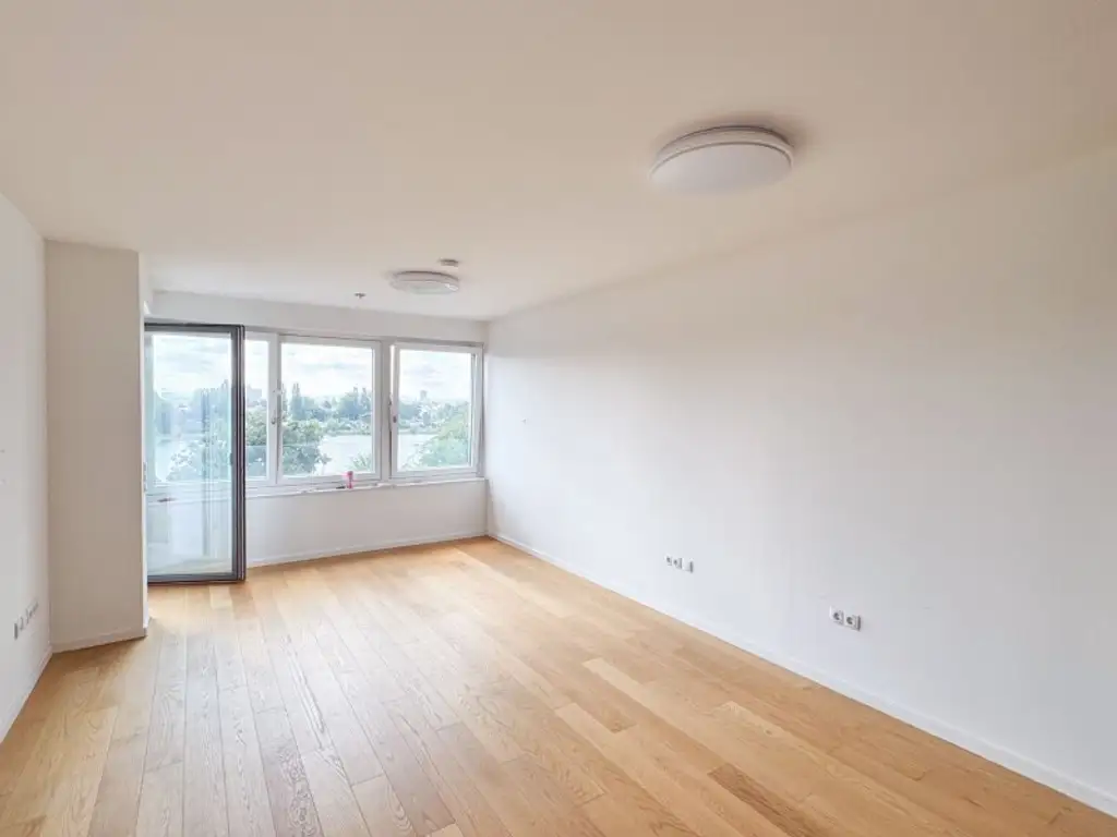 3-Zimmer-Wohnung mit Balkon & Blick auf die Alte Donau – Top-Zustand, klimatisiert, zentral begehbar!