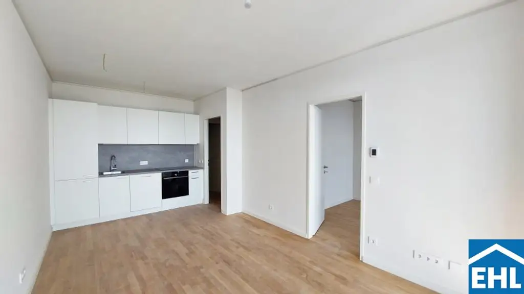 Wohnen mit Skyline-Flair – Rooftop Pool & Fitness bei der U1