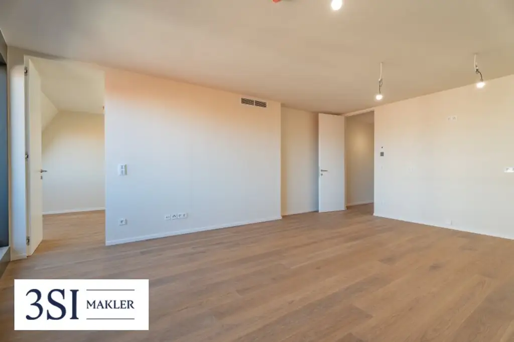 Ein Zuhause zum Wohlfühlen – moderne Dachgeschosswohnung mit Loggia