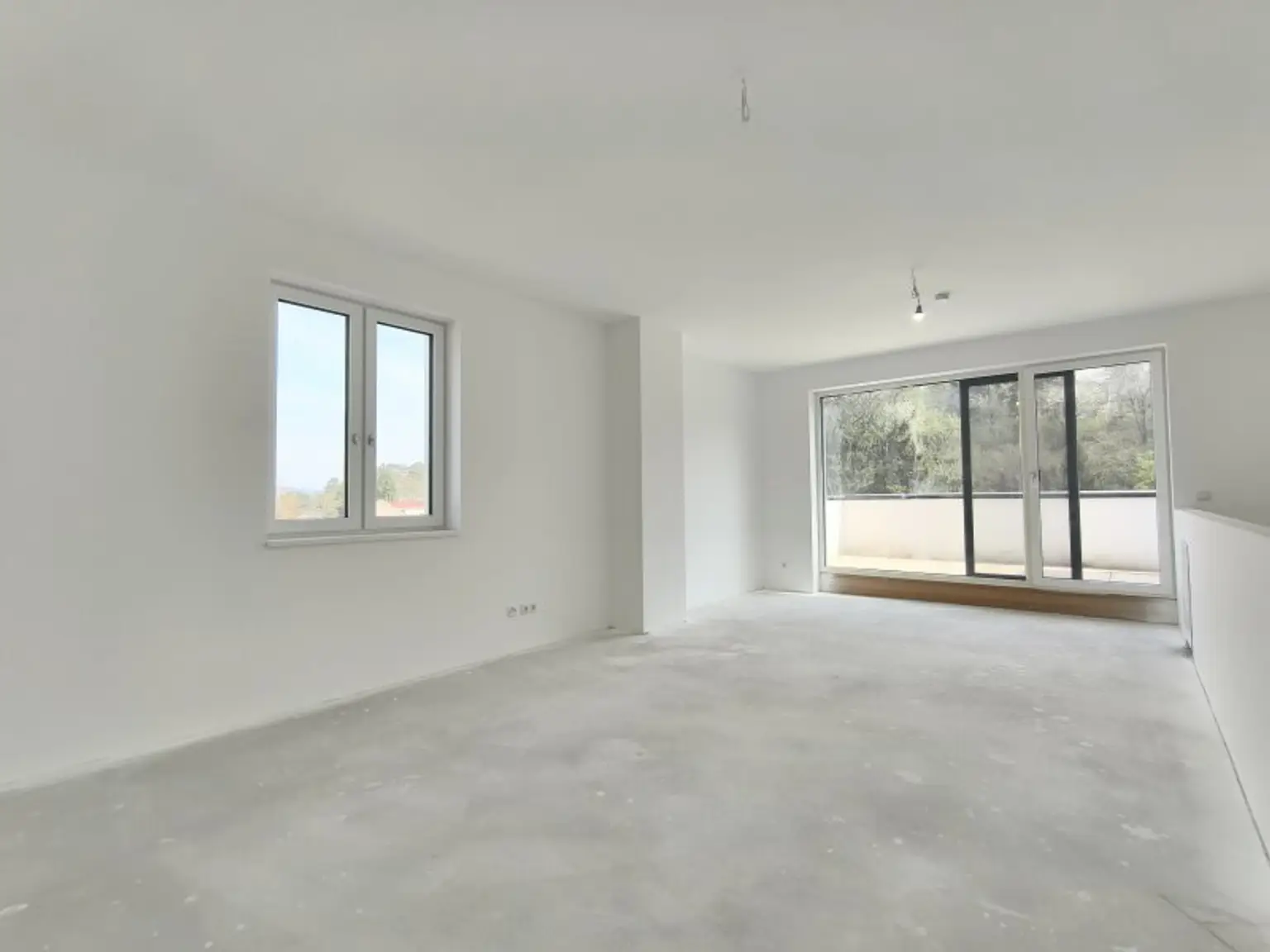 LEBENSQUALITÄT MIT AUSSICHT - EXKLUSIVES TOWNHAUS AUF EIGENGRUND IN WEIDLING – NATURNAHES WOHNEN MIT STIL