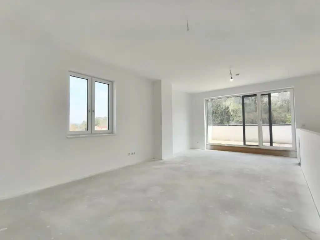 LEBENSQUALITÄT MIT AUSSICHT - EXKLUSIVES TOWNHAUS AUF EIGENGRUND IN WEIDLING – NATURNAHES WOHNEN MIT STIL