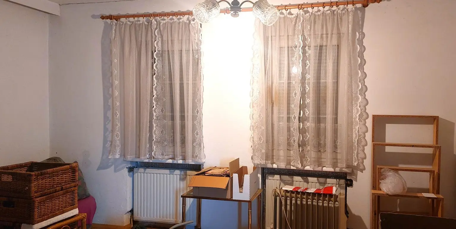 Einfamilienhaus mit doppelgeschoßigem Zubau