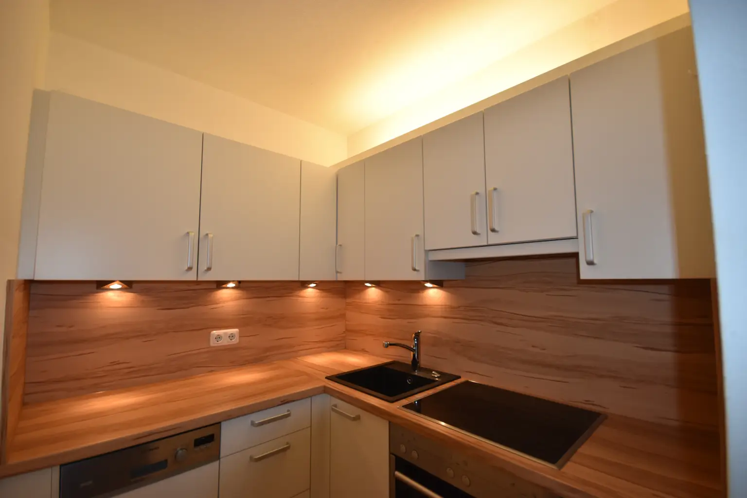 "AIGEN - Kleine gemütliche 2 Zimmer Wohnung mit Garten und PKW-Stellplatz"