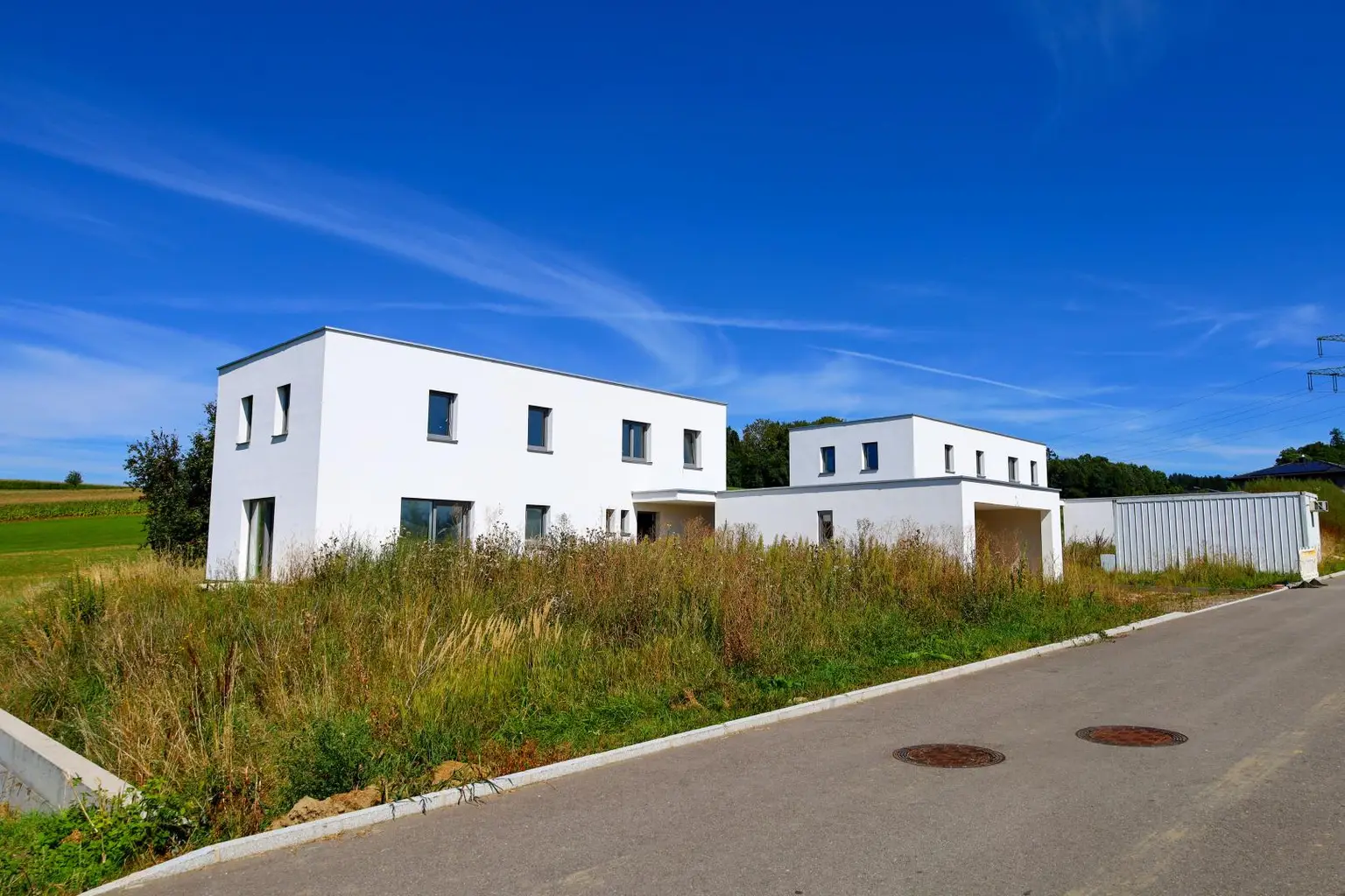 Neubau-Einfamilienhaus in St. Roman – modernes Wohnen mit offenem Design & Südwestgarten
