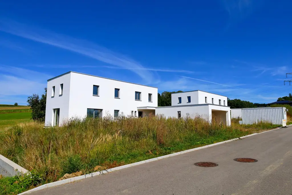 Neubau-Einfamilienhaus in St. Roman – modernes Wohnen mit offenem Design & Südwestgarten