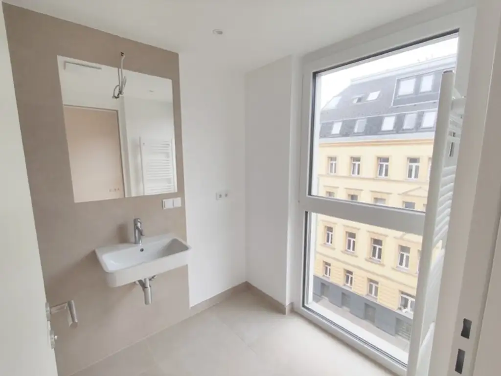 Modern wohnen in Meidling! Neubau 2-Zimmer-Erstbezug mit Balkon im 5. Liftstock - Top58
