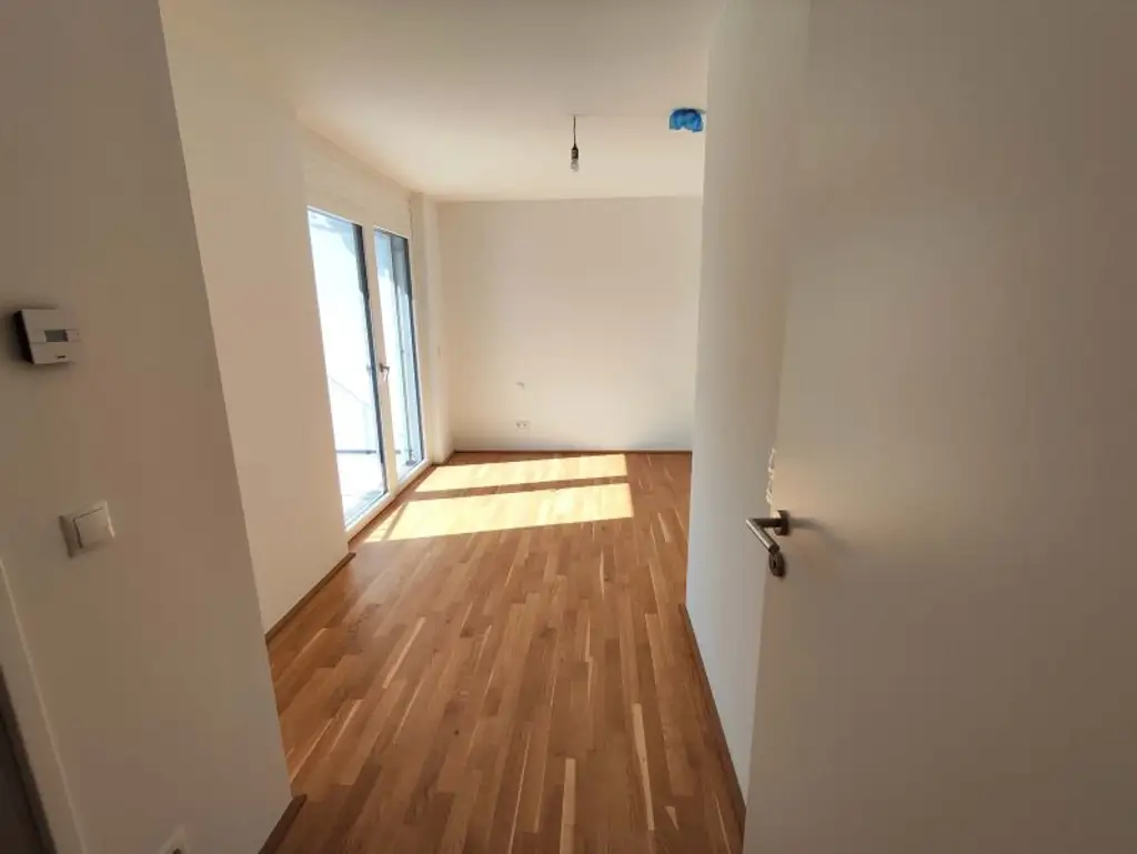 TOP NEUBAU 3-Zimmer-ERSTBEZUG mit Terrasse im 4. OG in 1210 Wien! Top 1/27