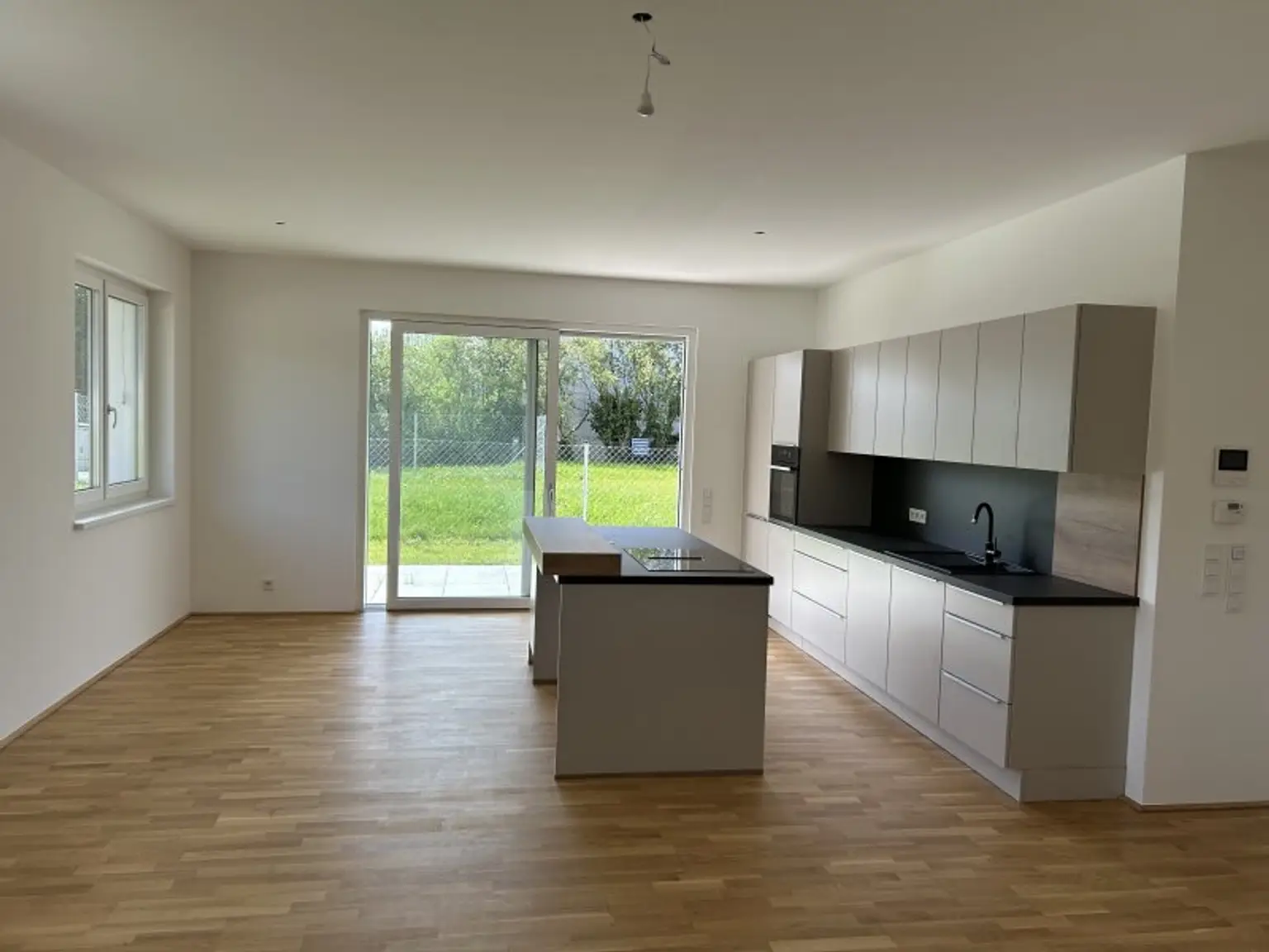 Perfekte Neubau Gartenwohnung | Steinhaus